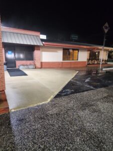 concrete walkway parking area