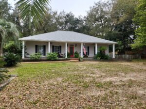 driveway sidewalk house siding roof deck