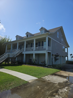 Soft Washing Exterior Surfaces Of The House in Pensacola FL