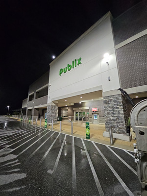Concrete Cleaning For Commercial Entrance And Parking Area in Pensacola FL